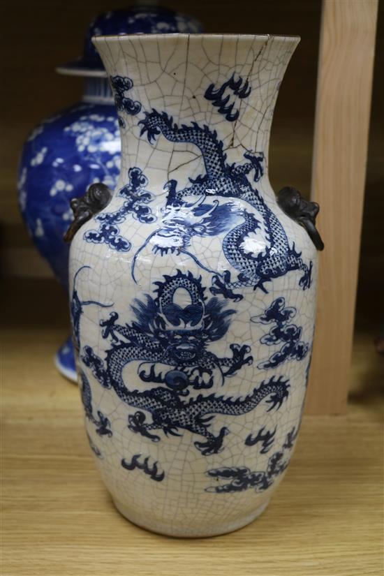 A large 19th century Chinese blue and white vase and cover and a crackle glaze dragon vase tallest 42cm
